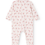 White jumpsuit with pink bow print and long sleeves, round neckline