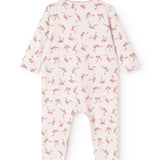 White jumpsuit with pink bow print and long sleeves, round neckline