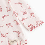 Nightgown with red bow print on light fabric and MarMar label at the edge