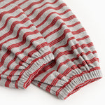 Gray and red striped romper with elastic hem and gathered leg openings