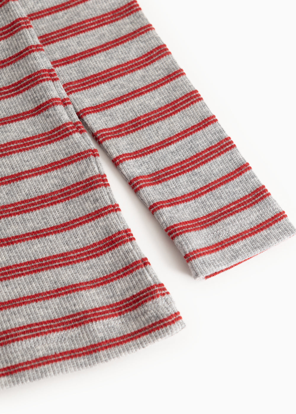 Tani long-sleeve T-shirt in gray with red stripes; visible seam and sleeve edge