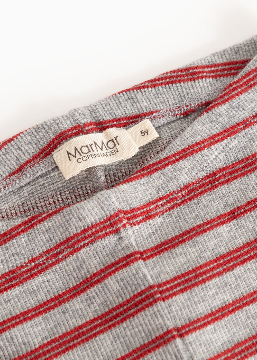 Gray leggings with red stripes, tight knit and brand label at the waist