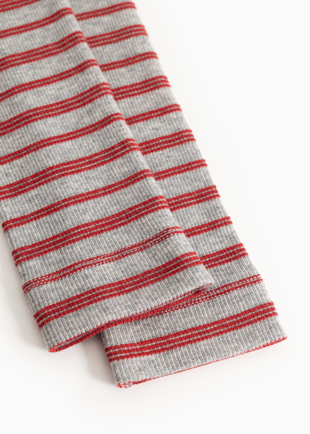 Gray knitted fabric with red stripes for leggings, folded edge