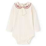 White bodystocking with red collar edge and bow-like detail at the front