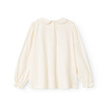 Offwhite blouse with button closure and puff sleeves, round neckline