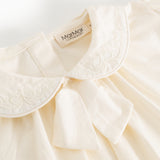 Offwhite blouse with embroidered collar edge and soft V-neckline in front