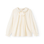 Off-white blouse with ruffle collar, button closure and puff sleeves