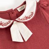 Red dress with white collar, red and white embroidery, and MarMar label inside.