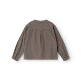 Close-up of long-sleeve shirt back panel in houndstooth pattern