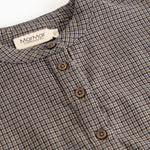 Detail: shirt collar and button placket in houndstooth check