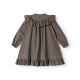 Children's dress with pied de poule pattern, ruffles at the neckline and flounced skirt.