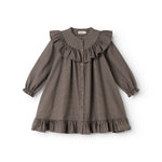 Children's dress with pied de poule pattern, button closure, and ruffle trim at collar and sleeves.