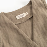 Brown boys' vest with collar and visible brand label at neck opening.