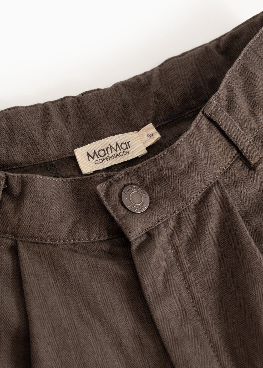 Children's trousers in dark brown with button closure and MarMar label at the waist