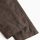 Children's pants in dark brown with straight leg hem and visible seam