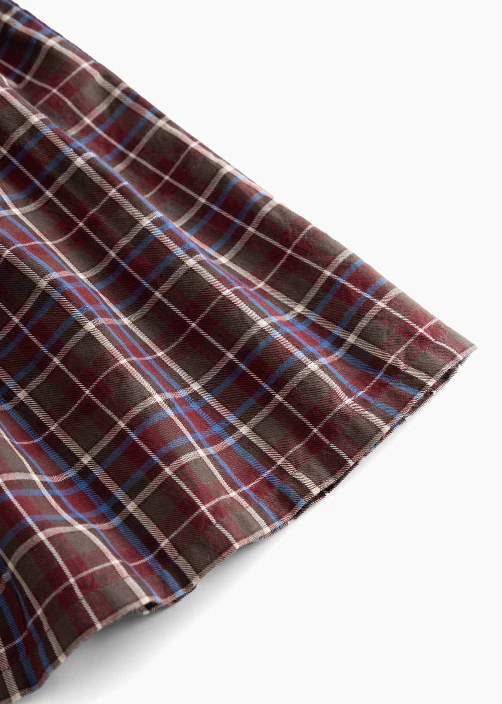 Gathered dress sleeves and skirt hem with loose, wider cut