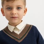 Children's knitted sweater in dark blue with V-neck, stripes in brown, blue and green at the collar.