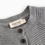 Gray knitted cardigan with ribbed edges, buttoned placket, and MarMar Copenhagen label