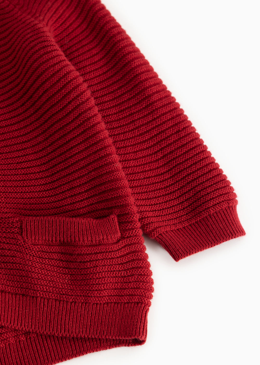 Red knitted cardigan with ribbed cuffs and hem