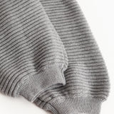Knitted grey melange trousers with ribbed cuffs at the bottom