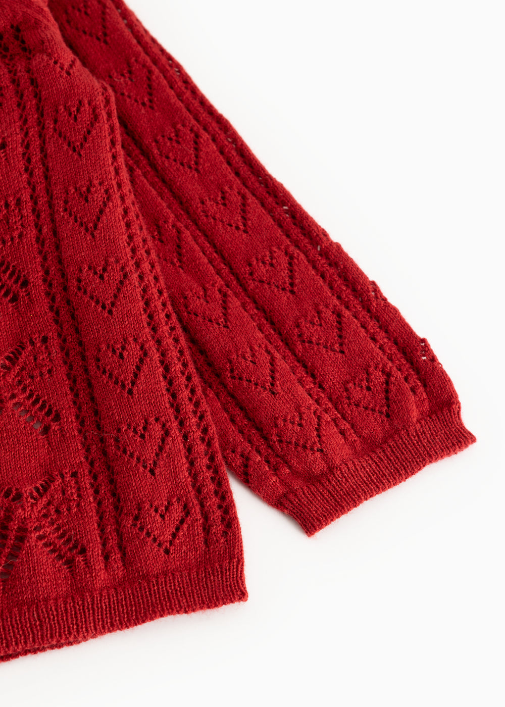 Bordeaux red knit cardigan with openwork pattern and ribbed cuffs