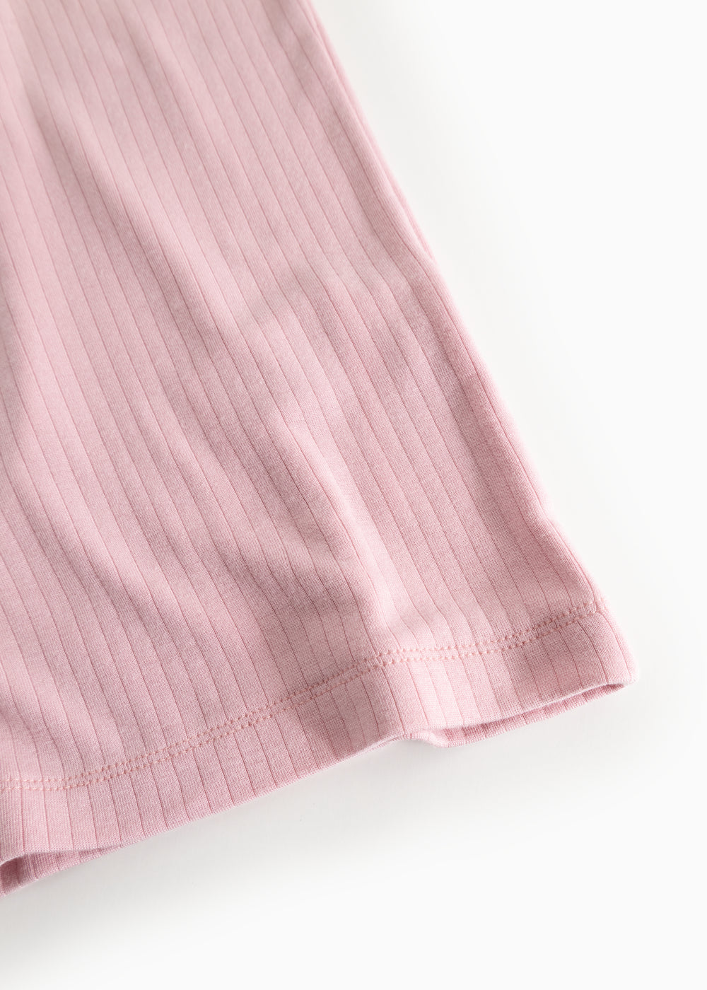 Pink ribbed hem and cuffs on long-sleeve T‑shirt