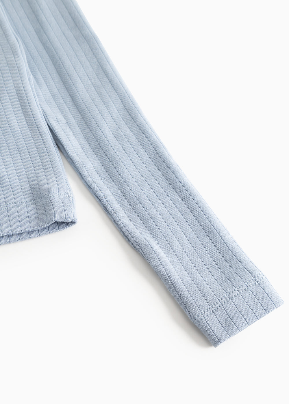 Light blue ribbed long-sleeve T‑shirt, sleeve detail