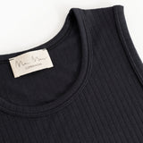 Sort tank top with round neckline and visible label at the collar.