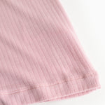 Sleeveless top bottom with ribbed edge and pink stitching