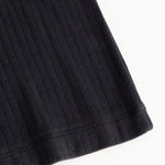 Sort natural coil in rib stitch with close-fitting fall and visible edge