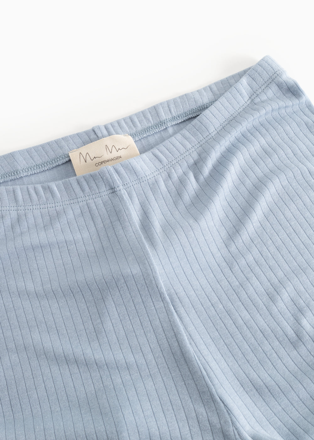 Light blue pants with elastic waistband and internal label.