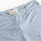 Light blue pants with elastic waistband and internal label.