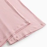 Pink cotton pants with ribbed fabric and double-stitched hem.