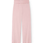 Pink denim pants with elastic waistband and ribbed surface.
