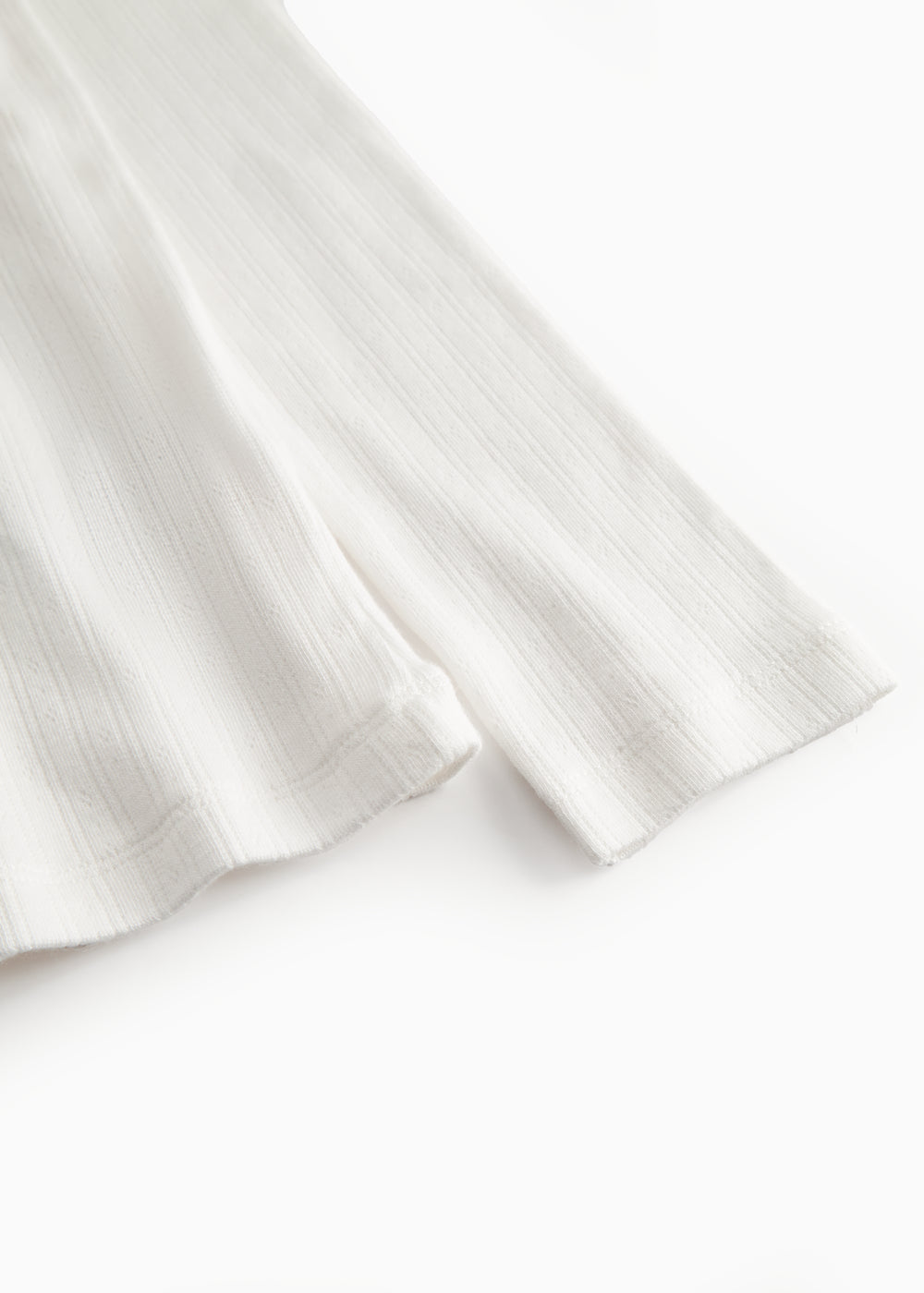 White long-sleeved pointelle t-shirt for women