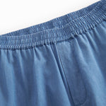 Blue denim women's jeans with elastic waist and straight legs