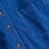 Blue button-down shirt with buttons, chest pocket, and highlighted seams.