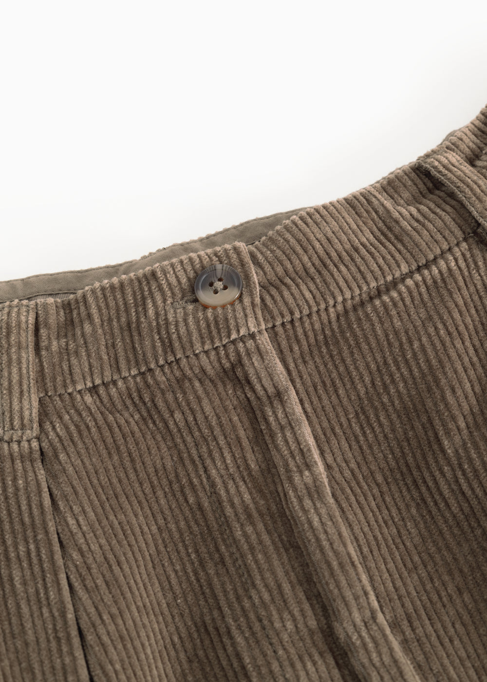 Brown bottom: narrow ribbing with button and vertical seams