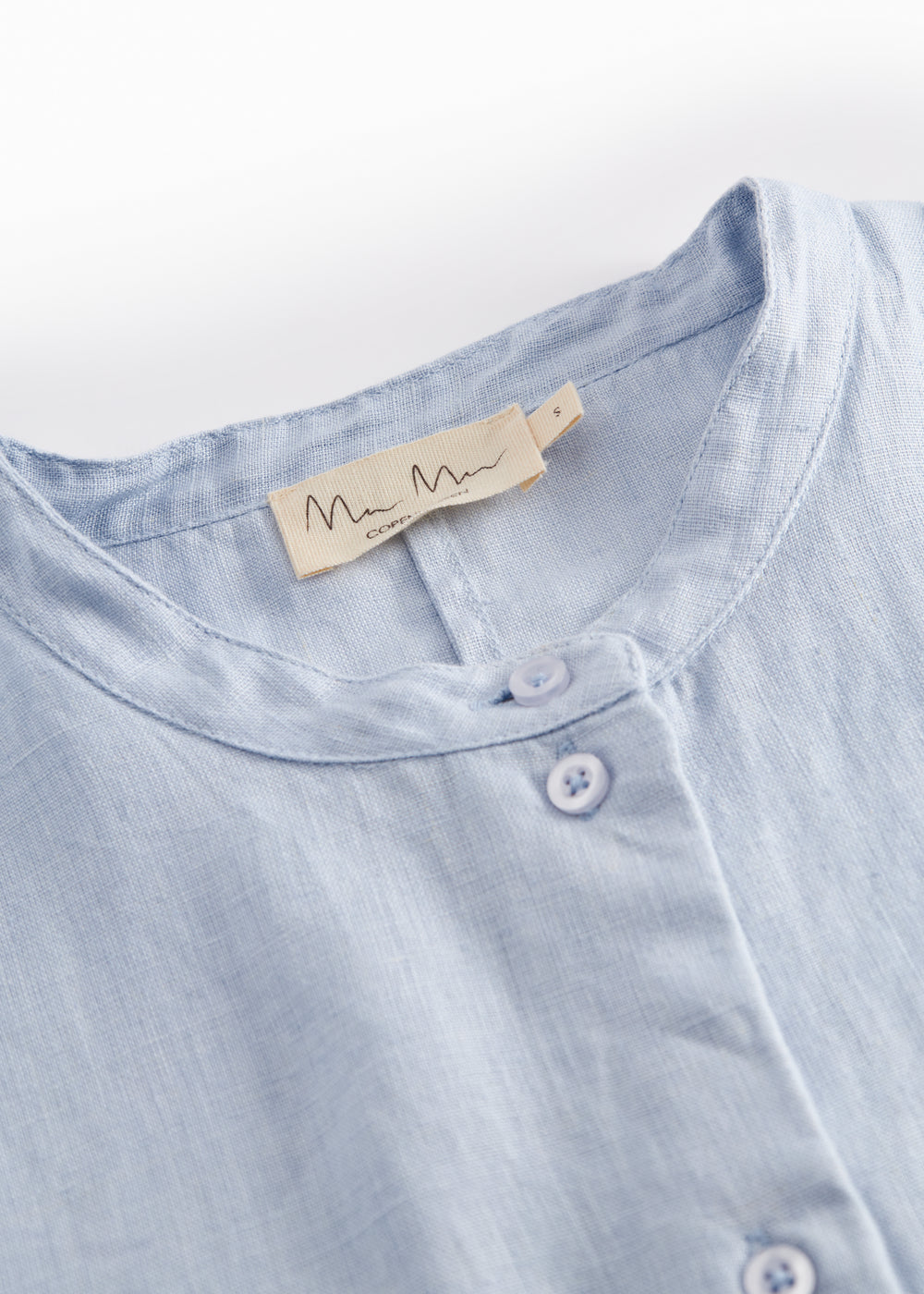 Short light blue shirt for women