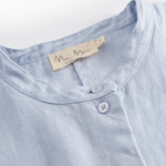 Short light blue shirt for women