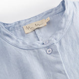 Short light blue shirt for women