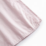 Red dress with short sleeves and a button-up closure.