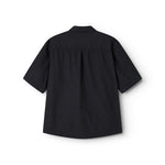 Short black shirt for women with a loose fit, classic collar.