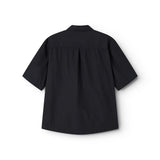 Short black shirt for women with a loose fit, classic collar.