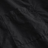 Kortærmet sort skjorte til kvinder med en løs pasform, klassisk krave