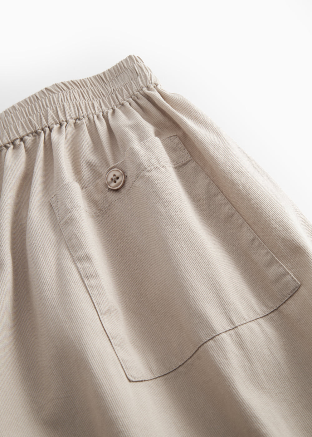 Gray pants for women with a, elastic in in the and and pocket.