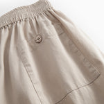 Gray pants for women with a, elastic in in the and and pocket.