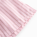 Red short-sleeved shirt for women with fine stripes, classic collar, breast pockets, and front button closure.