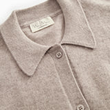 Details of the gray melange cardigan: collar, buttons, and inner label