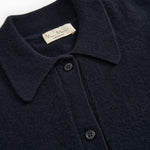 Kashmir cardigan with collar and button closure, close-up of fabric and brand